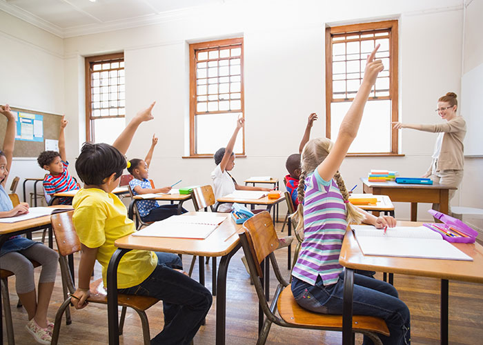 Classroom with students and a teacher
