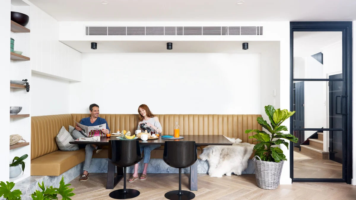 Ducted air conditioning in a bright living space