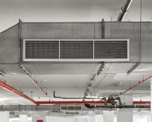 industrial-air-duct-ventilation-equipment-pipe-systems-installed-industrial-building-ceiling